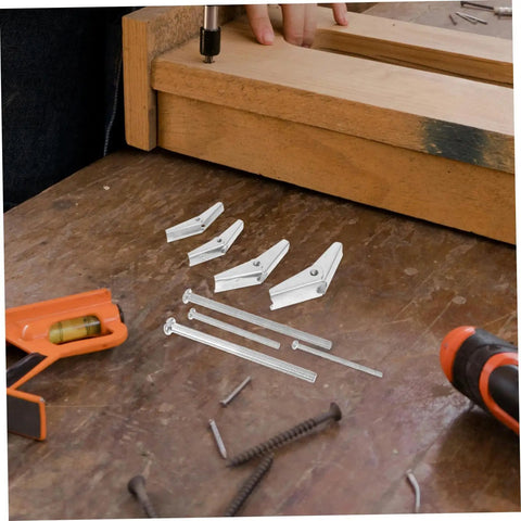 Heavy Duty Toggle Bolt Kit 32 Pcs With Metal Drywall Anchors And Butterfly Expansion Screws For Secure Fastening And Easy Installation Built To Handle Mirrors, Shelves, And Heavy Furniture. toggle bolts and drywall anchors on wood shelf