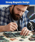 Man using Precision Magnetic Screwdriver Set With S2 Steel Bits And Aluminum Handle on electronic circuit board.