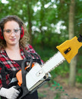 Universal Chainsaw Sharpener Kit With 12 Sharpening Stones And One Preinstalled Stone, shown on chainsaw in outdoor setting