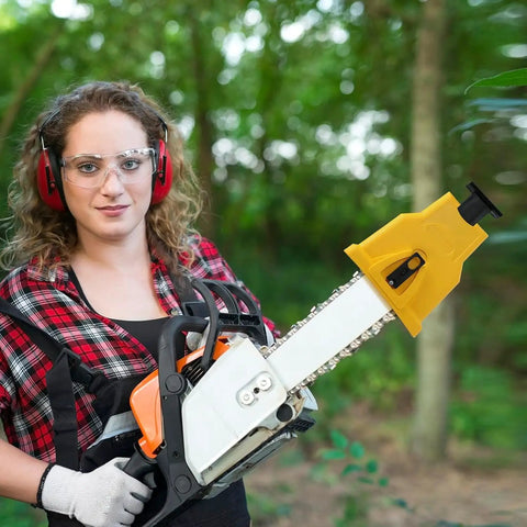 Universal Chainsaw Sharpener Kit With 12 Sharpening Stones And One Preinstalled Stone, shown on chainsaw in outdoor setting