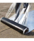 Self Healing Butyl Roofing Seal Tape With Reflective Aluminum Foil Backing For Waterproof Gutter Window And Shingle Jobs Heavy Duty Grip Tough As Nails Odorless, unrolling on a flat surface.