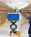 Rock Solid Double Scissor Hydraulic Lift Table Cart 770 Lbs Capacity 51 Inch Lift Height moving a blue box in warehouse.