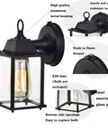Close-up of 2 Pack Dusk To Dawn Outdoor Wall Mount Light Fixture with black finish, clear glass, and photocell sensor.