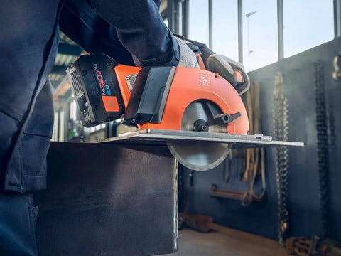 Built Tough Cordless Circular Saw For Zero Sweat Cold Cutting Sheet Metal And Pipe No Spark Action in use on metal sheet.
