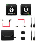 Plug-And-Play Ultra Compact Wireless Microphone System With Built-In Mics, cables, and accessories on white background.