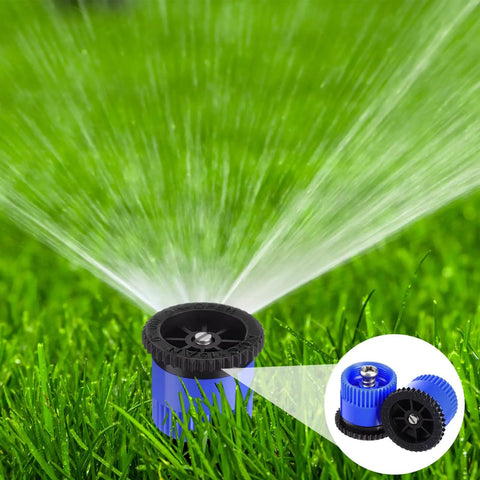 16 Piece Top Shelf Blue Lawn Sprinkler Head Replacement Kit With 15 Van Slick Swivel Nozzles Rotating Seamlessly From 0 To 360 Degrees For A Hassle Free Yard Irrigation Setup. Blue sprinkler spraying water on grass.