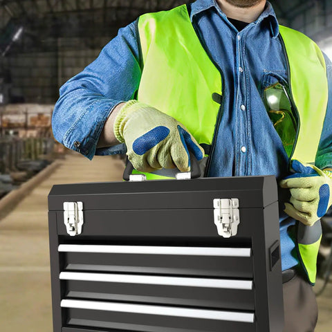 Worker holding Three Drawer Portable Tool Box With Locking System, Steel Construction, Smooth Glide Drawers, Black in warehouse.