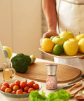 Manual Salt And Pepper Grinder Set With Ceramic Blades, Adjustable Coarseness, Stainless Steel Cap on kitchen counter
