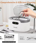 600ml Ultrasonic Jewelry Cleaner with Digital Timer cleaning glasses on a desk, showcasing compact design and effective results.
