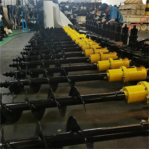 Hydraulic Earth Auger For Mini Excavator Backhoe Post Hole Digger Attachment lined up in a workshop for landscaping and construction projects
