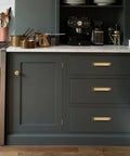 Kitchen scene with dark cabinets featuring 10 Pack Champagne Bronze Cabinet Handles 5.9 Inch Length Center To Center 5 Inches Heavy Duty Zinc Alloy