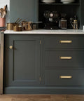 Kitchen cabinetry with Ten Pack Three And Three Quarters Inch Champagne Bronze Cabinet Pulls Satin Brass Gold Hardware visible on drawers.