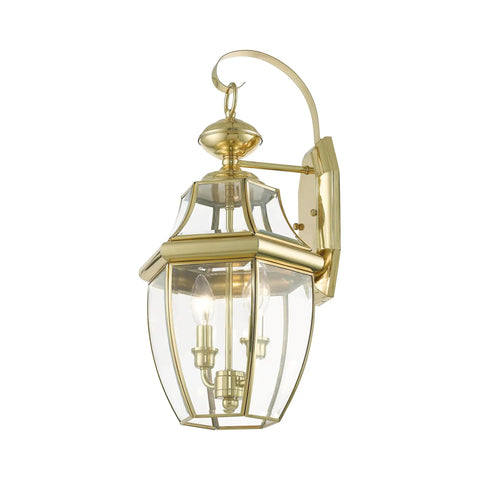 Monterey Two Light Outdoor Wall Lantern in Polished Brass Finish, clear beveled glass, side angle view