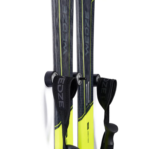 Super Sleek Ski Wall Mount Rack Keeps Your Skis Tight And Scratch Free With Hybrid Edge Guard Tech holds pair of WEDZE skis vertically.