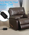 Recliner Power Supply Adapter 29V 2A DC Transformer With Easy Plug And Play Setup For OKIN Limoss Lazboy Pride And More 100-240V AC Input Auto Volt Current Adjust 29V And 24V DC Output Replacement Part For Home Comfort. Black 2-pin recliner power adapter beside a leather chair.