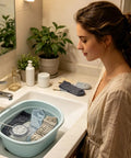 Compact Mini Washing Machine Portable USB Powered Clothes Washer No Sweat Deep Clean with socks in sink.