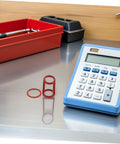 Silicone Sealing Ring Set For Ice Cream Makers, Low Temperature Resistant, Leakproof 6 Pack Gaskets For Home Ice Cream Machines, High Humidity Reliable Seals That Stay Locked In During Cleaning And Freezer Runs. Red silicone sealing rings beside calculator