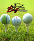 Big Easy White Golf Tees Set With 0.75 Inch Big Head 3.25 Inch Adjustable Height 6 Prong Low Friction Design Pro Grade Reinforced Break Resistant Construction Silicone Stoppers 12 Tees And 12 Stoppers Game Ready, three golf balls on tees in grass