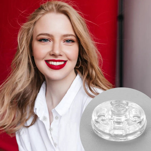 Smiling woman in white shirt with close-up of clear plastic sew-on snap button on the side