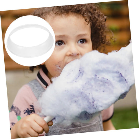 Child enjoying cotton candy with a Cotton Candy Machine Guard Cover for sugar floss makers lightweight and reusable enclosure easy to clean indoor use mess free protection that keeps little fingers safe and your countertop clean in the corner inset.