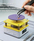 Pro Tier Mini Grinding Machine Featuring Digital Display And 10000 Rpm Speed for polishing tweezers on a purple grinding disk.