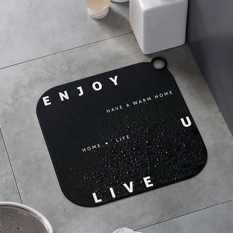 Hair Stopper Shower Drain Strainers Silicone Adjustable, A on a wet floor mat with motivational text, square shape, black color.
