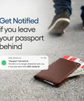 Straight Up The No Sweat Apple Find My Compatible Passport Holder With Built In Tracking And Mfi Certification Featuring Heavy Duty Rfid Shielding Plus A Three Year Rechargeable Battery For Super Smooth Trips In Brown on a concrete surface, showcasing both the holder and notifications.