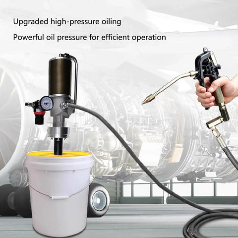 No Frills Heavy Duty Pneumatic Grease Pump For 5 Gallon Drums with a hose and nozzle in a workshop setting.