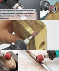 Aluminum Oxide Sanding Drum Kit with 198 Sanding Bands in use on wood and metal, showcasing durability and detail work