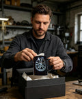 Man unwrapping a Solid Build Ceramic Coffee Mug with car wheel design, a durable sipper ideal for hot or cold drinks.