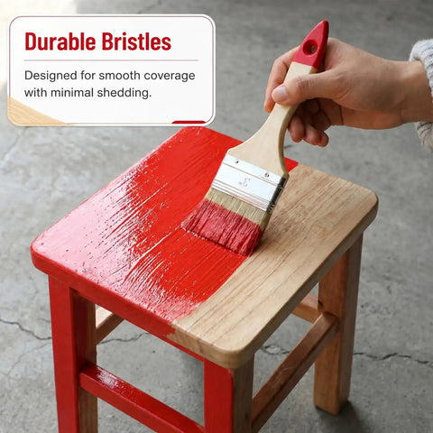 Hand using 3-inch paint brush on wooden stool, demonstrating smooth application, part of 6 Inch Deck Stain Brush With 77 Inch Extendable Handle And 3 Inch Paint Brush Set For Wood Fence And Wall Durable Synthetic Bristles For Smooth Even Deck Stain Application.