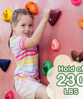 Child climbing on colorful holds of 32 Piece Rock Climbing Holds Set For Kids And Adults, with hold capacity 230 lbs.