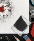 Iron powder and filings set showing magnetic field patterns around a red magnet, ideal for physics classroom demos and STEM experiments.