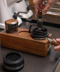 Game Changing 58mm Espresso Puck Distributor Tool With Adjustable Height And Eight Precision Needles To Break Up Clumps Quick For Creamy Fresh Pulls Daily A Total Home Cafe Upgrade That Is Totally Worth It in use with wooden base and tool.