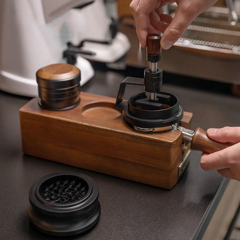 Game Changing 58mm Espresso Puck Distributor Tool With Adjustable Height And Eight Precision Needles To Break Up Clumps Quick For Creamy Fresh Pulls Daily A Total Home Cafe Upgrade That Is Totally Worth It in use with wooden base and tool.