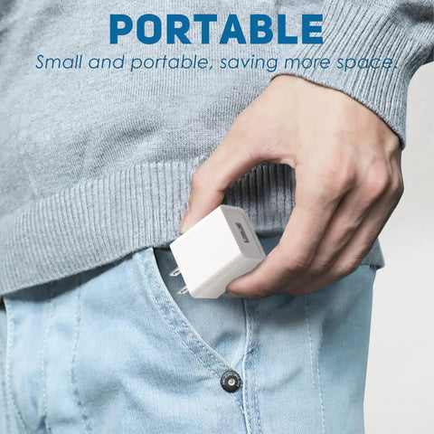 Person placing 5V 2A USB Wall Charger For Sonicare Electric Toothbrushes And Water Flossers into pocket, white adapter.