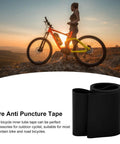 Bicycle with 80mm Rim Tape Tire Liner Anti Puncture Tape for 26 Inch Road Snow Fat Bike Tires shown with sunset backdrop.