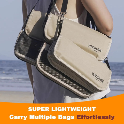 Person carrying ultra portable 11.5 inch collapsible camping stool with two side pockets on a beach, lightweight design.