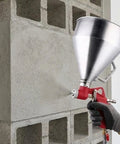 Pro Level Air Spray Gun Kit With Swap Out Three Liter And Six Liter Tanks in use on textured wall, delivering smooth atomization.