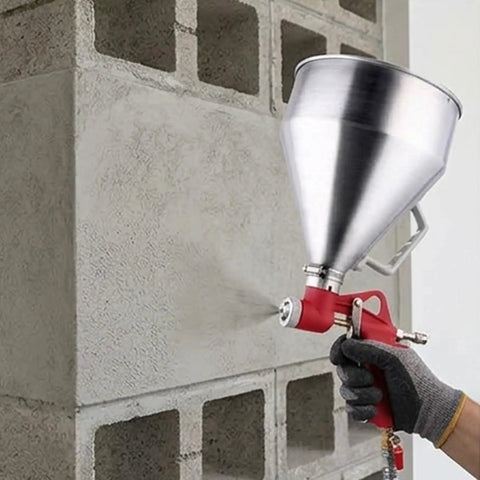 Pro Level Air Spray Gun Kit With Swap Out Three Liter And Six Liter Tanks in use on textured wall, delivering smooth atomization.