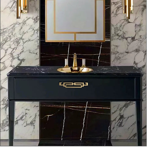Black vanity with gold accents in a marble bathroom setting, featuring Antique Chinese Style Cabinet Pulls 4 Pack Zinc Alloy Drawer Handles.