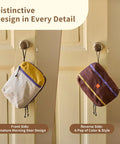 Water Resistant Travel Toiletry Bag With Hidden Carabiner Hook And Hanging Loop in two color designs on door knobs