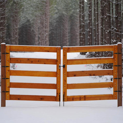 Wooden fence gate with Six Pack Strap Hinges Set, 2 Inch Heavy Duty Shed Door Hinges with Screws, in snowy forest.