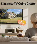 Person and dog watching TV with Beige One Cord Cable Hider Kit for Walls, 85 Inch Cord Covers For TV Wires visible on wall.