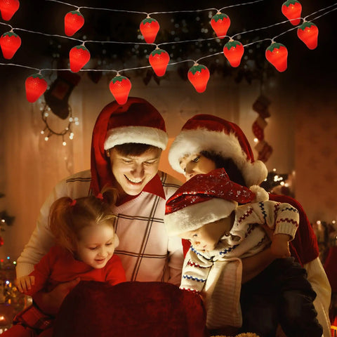 Family enjoying Warm Strawberry String Lights 10 Foot With 20 LEDs Battery Powered Indoor Outdoor Decor For Wedding Home Garden Patio Party Christmas Tree Cute Vibe Lighting in cozy setting