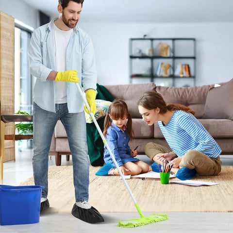 Family using Disposable Shoe Covers Large Pack 100 Count Waterproof Non Slip Bootie Covers for indoor tasks on clean floor.