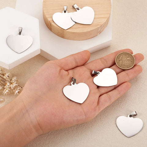Front view of heart-shaped stainless steel pendant charms with snap-on bails, 33mm, 10 pcs for DIY jewelry