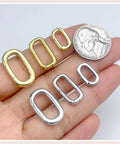 10Pcs Carabiner Clip Pendant Clasps in 18K Gold Tone for Necklaces and Bracelets with coin for size reference on hand