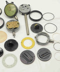 Solid Haul Of Dial Test Indicator Spare Parts And Heavy Duty Hardware For Precision Measuring Tools BR11576CZ5 assorted parts including dials and rings