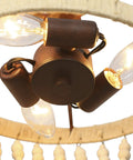 Close-up of Wood Beaded Semi Flush Mount Ceiling Light 3 Light Farmhouse Boho Style Cozy Chandelier with bulbs and wood beads.